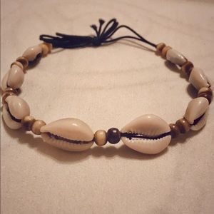 Adjustable shell choker